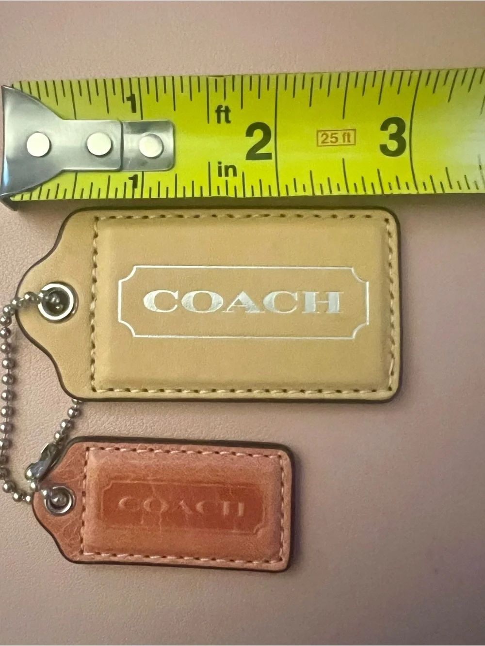 Set of two Coach tags